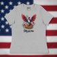 Close-up of Still We Rise design on athletic heather with American flag background