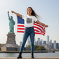 Female wearing Turn the Volume Up t-shirt at Statue of Liberty