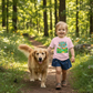 Little girl hiker with dog wearing pink Little Hikers Club tee