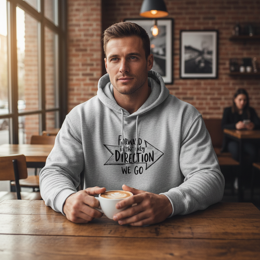Man in gray Forward hoodie at coffee shop