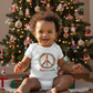 Peace on Earth Baby Bodysuit - Farm lifestyle shot