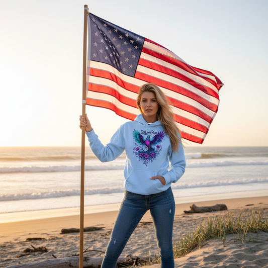 Still We Rise hoodie lifestyle beach scene